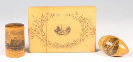 A Victorian Mauchline ware visiting card case with titled view of 'Petworth Church', length 11cm,