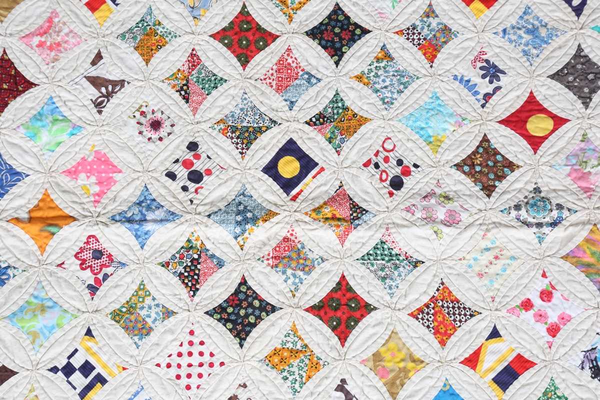 A mid-20th century 'Cathedral Window' cotton patchwork quilt, 230cm x 193cm. - Image 2 of 9