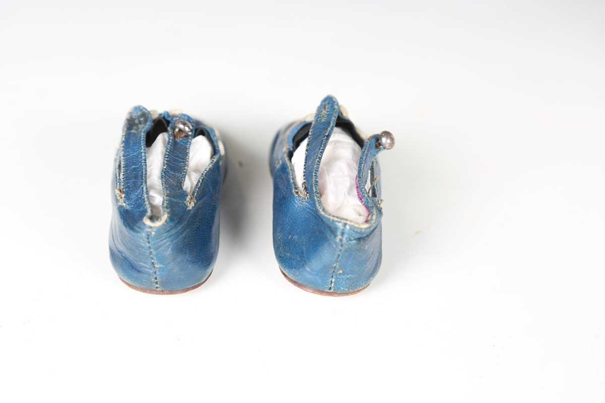A pair of 19th century blue leather infant's shoes with applied mother-of-pearl buttons and polished - Image 5 of 8