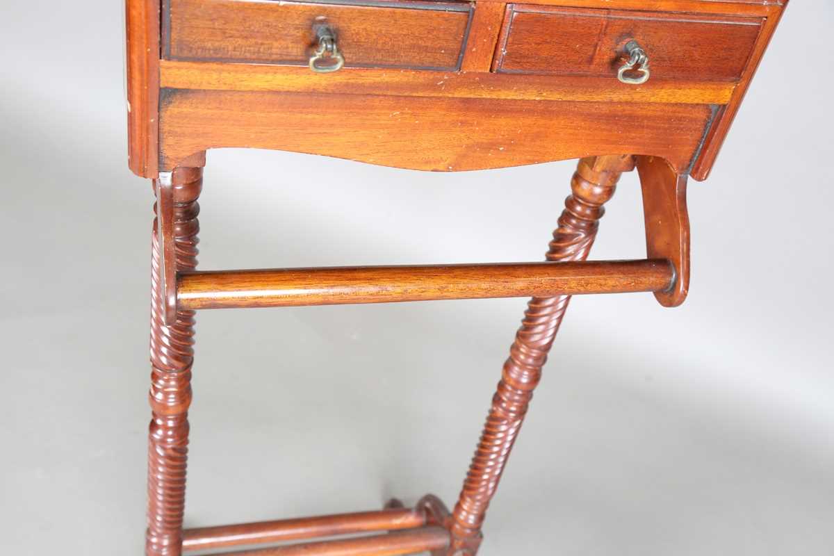 A late 20th century reproduction mahogany suit rack, raised on spiral reeded supports, height 122cm, - Image 6 of 10