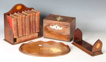 An Edwardian mahogany table-top bookcase, width 21cm, together with a sliding bookrack, an oval tray