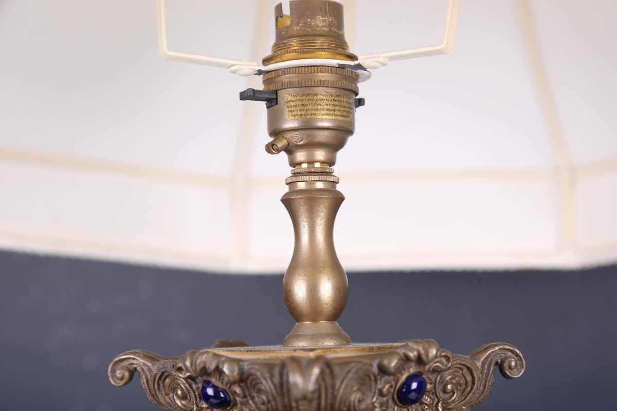 A modern blue glazed porcelain and brass mounted table lamp with ram's head and foliate mounts, - Image 2 of 11