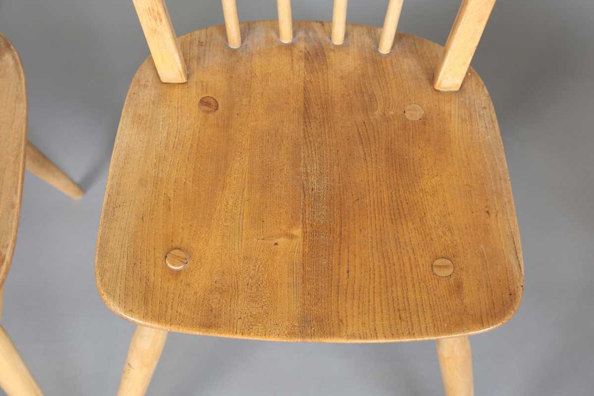 A set of four mid-20th century beech and elm Ercol style hoop back kitchen chairs, height 85cm, - Image 6 of 8