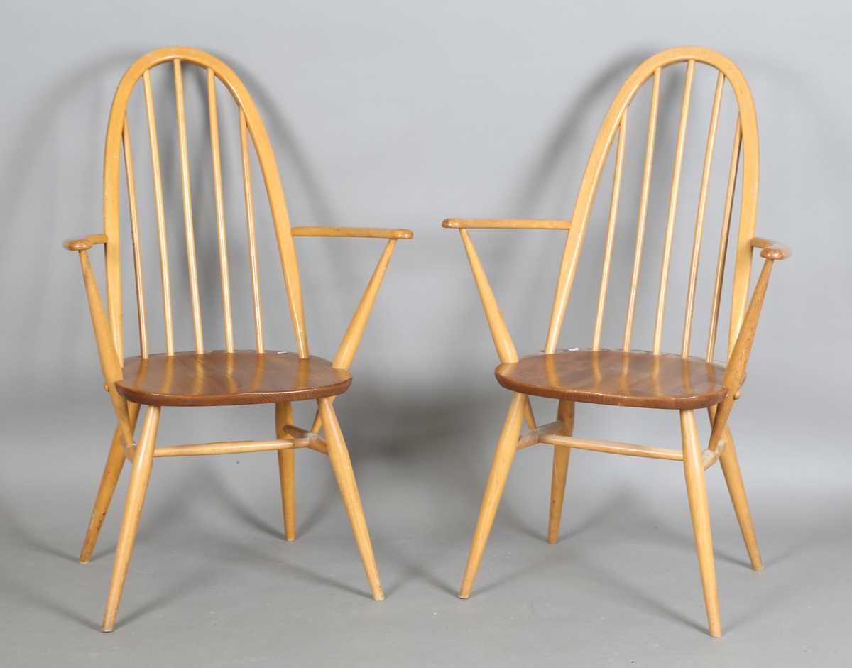 A pair of Ercol stick and hoop back Windsor armchairs, height 96cm, width 62cm.