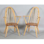 A pair of Ercol stick and hoop back Windsor armchairs, height 96cm, width 62cm.