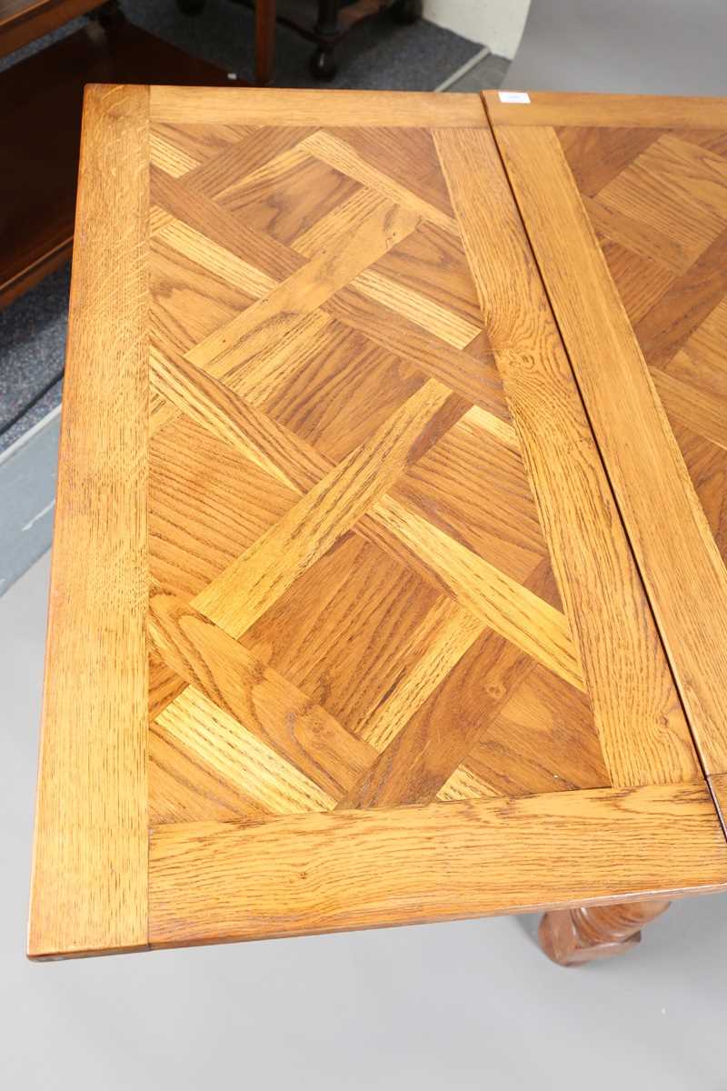 A 20th century French parquetry oak draw-leaf dining table, on turned legs, height 75cm, length - Image 3 of 10