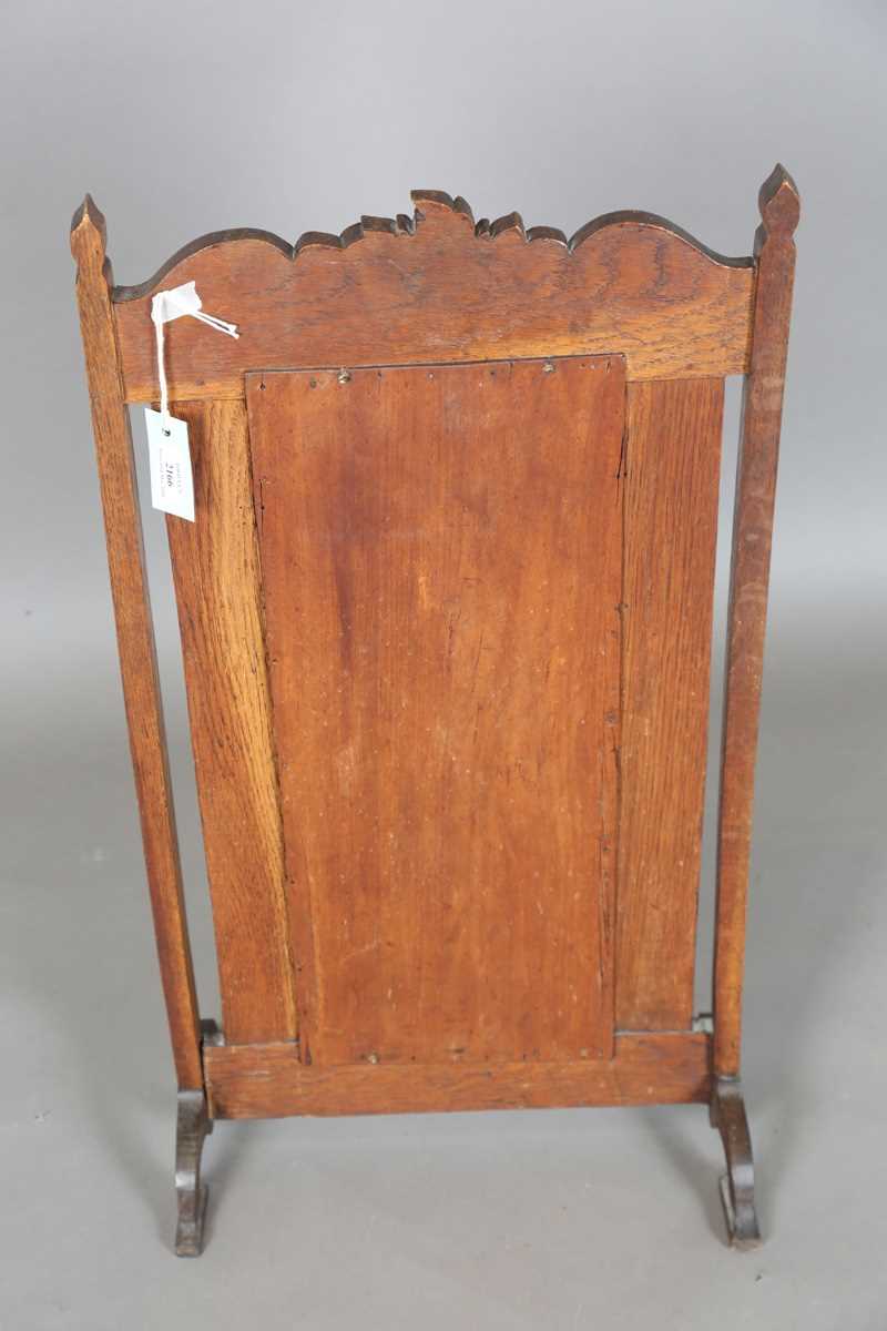 A late Victorian Arts and Crafts oak framed and copper inset firescreen, the panel worked with - Image 7 of 7