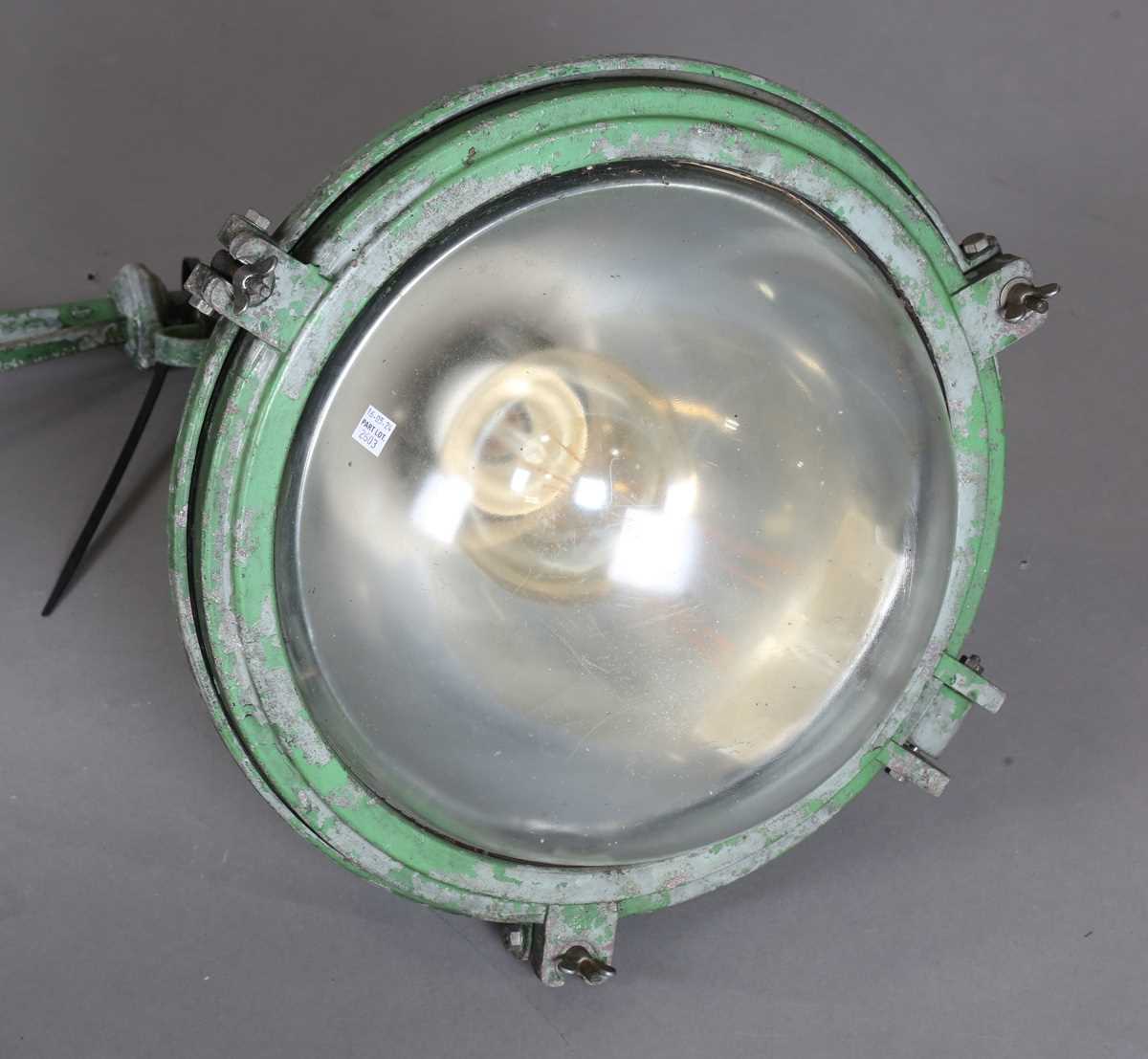 A pair of mid-20th century cast metal railway station wall lights with domed glass shades, - Image 2 of 7