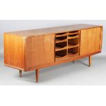 A mid-20th century Danish teak sideboard, in the manner of Bernard Pedersen & Son, fitted with two