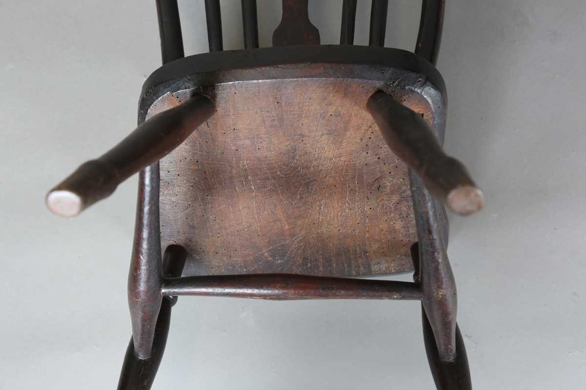 A 19th century child’s beech and elm Windsor chair, on turned legs united by stretchers, height - Image 6 of 17