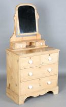 A Victorian pine dressing chest with swing mirror above drawers, height 154cm, width 83cm, depth
