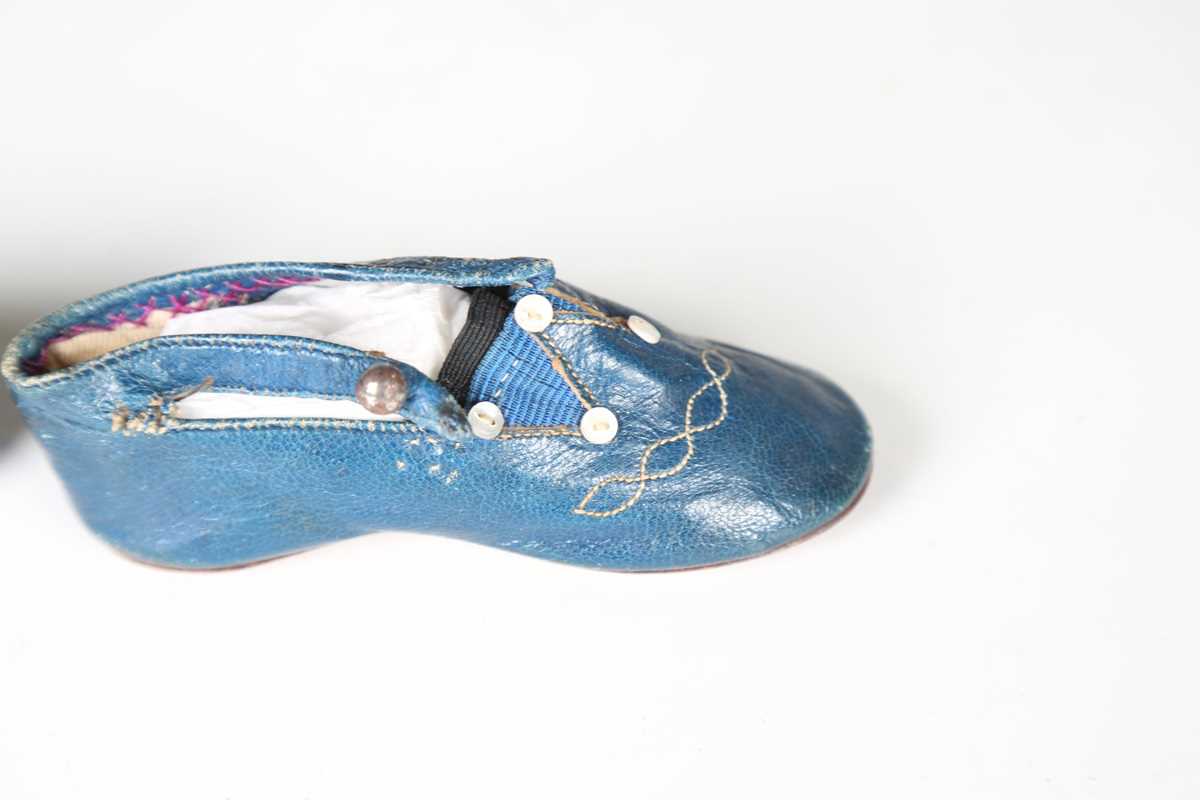 A pair of 19th century blue leather infant's shoes with applied mother-of-pearl buttons and polished - Image 3 of 8