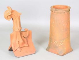 A late Victorian terracotta roof ridge finial of scroll form by W. Meeds & Son, Burgess Hill,