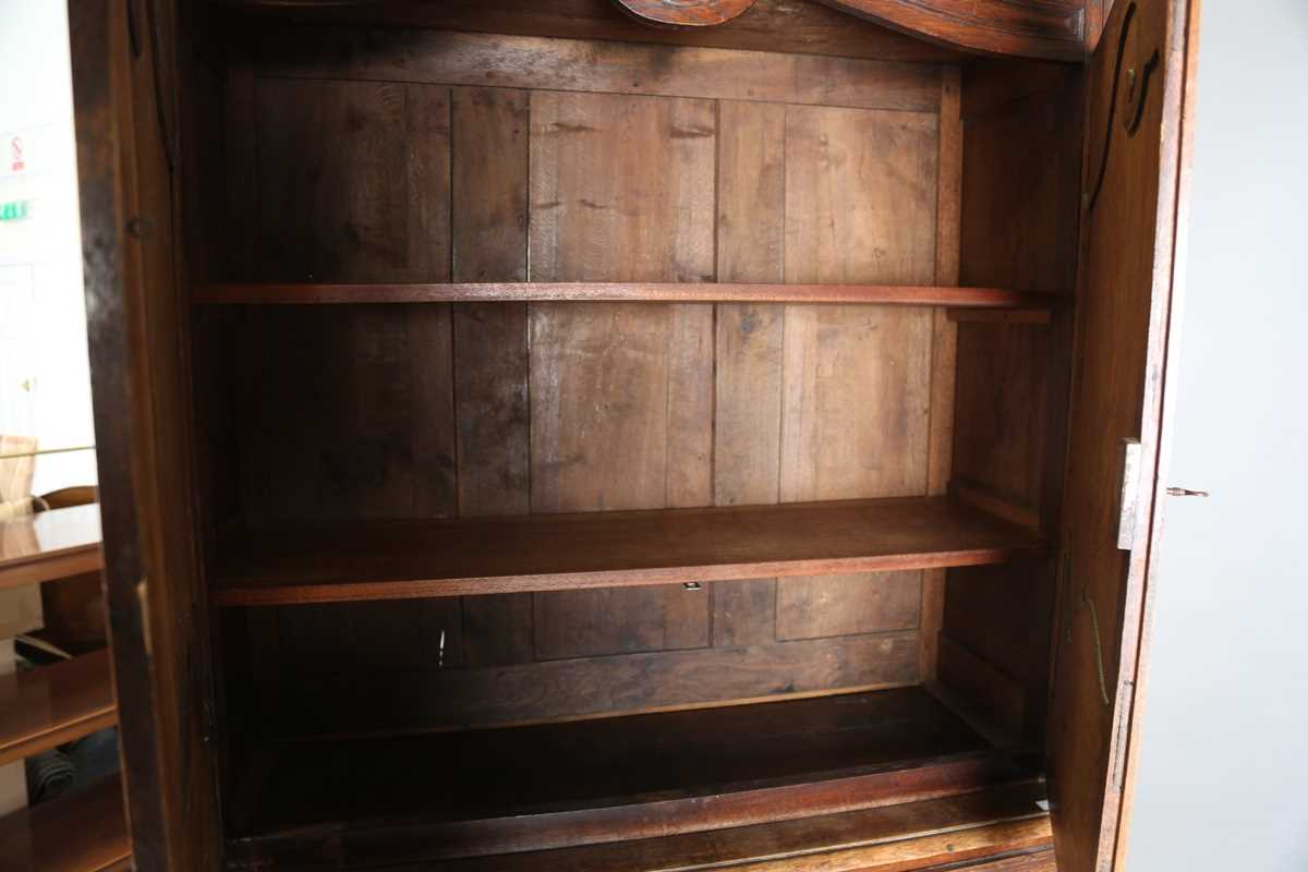 A 19th century French oak side cabinet with an arched pediment and four carved panel doors, height - Image 6 of 14