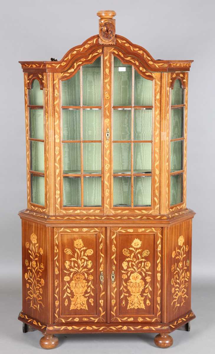 A late 19th century Dutch floral marquetry side cabinet, profusely inlaid with flowers on a mahogany