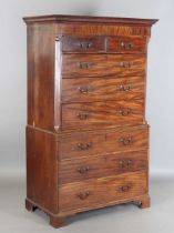 A George III mahogany chest-on-chest with inlaid foliate panels and oak-lined drawers, height 185cm,