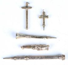A group of five late 19th century gilt metal propelling pencils, including one in the form of a monk