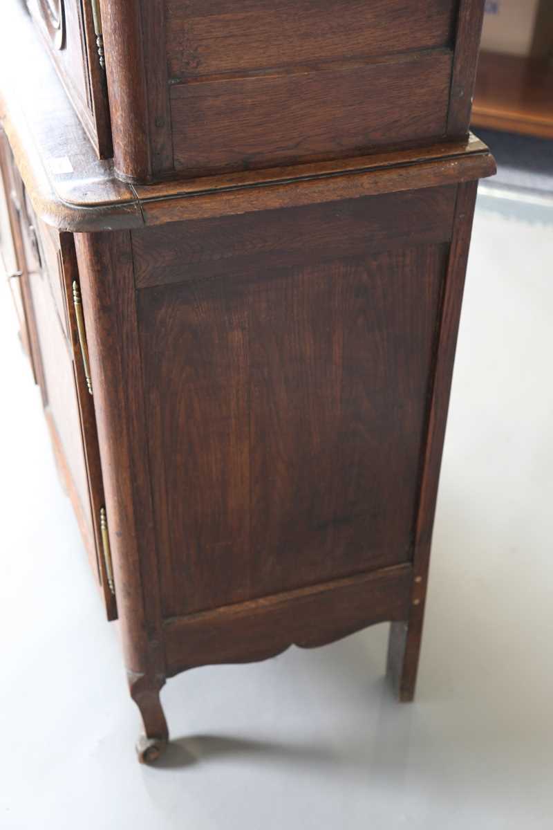 A 19th century French oak side cabinet with an arched pediment and four carved panel doors, height - Image 14 of 14