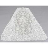 A 19th century Brussels Point de Gaze lace triangular panel, probably from the train of a dress,