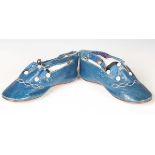 A pair of 19th century blue leather infant's shoes with applied mother-of-pearl buttons and polished