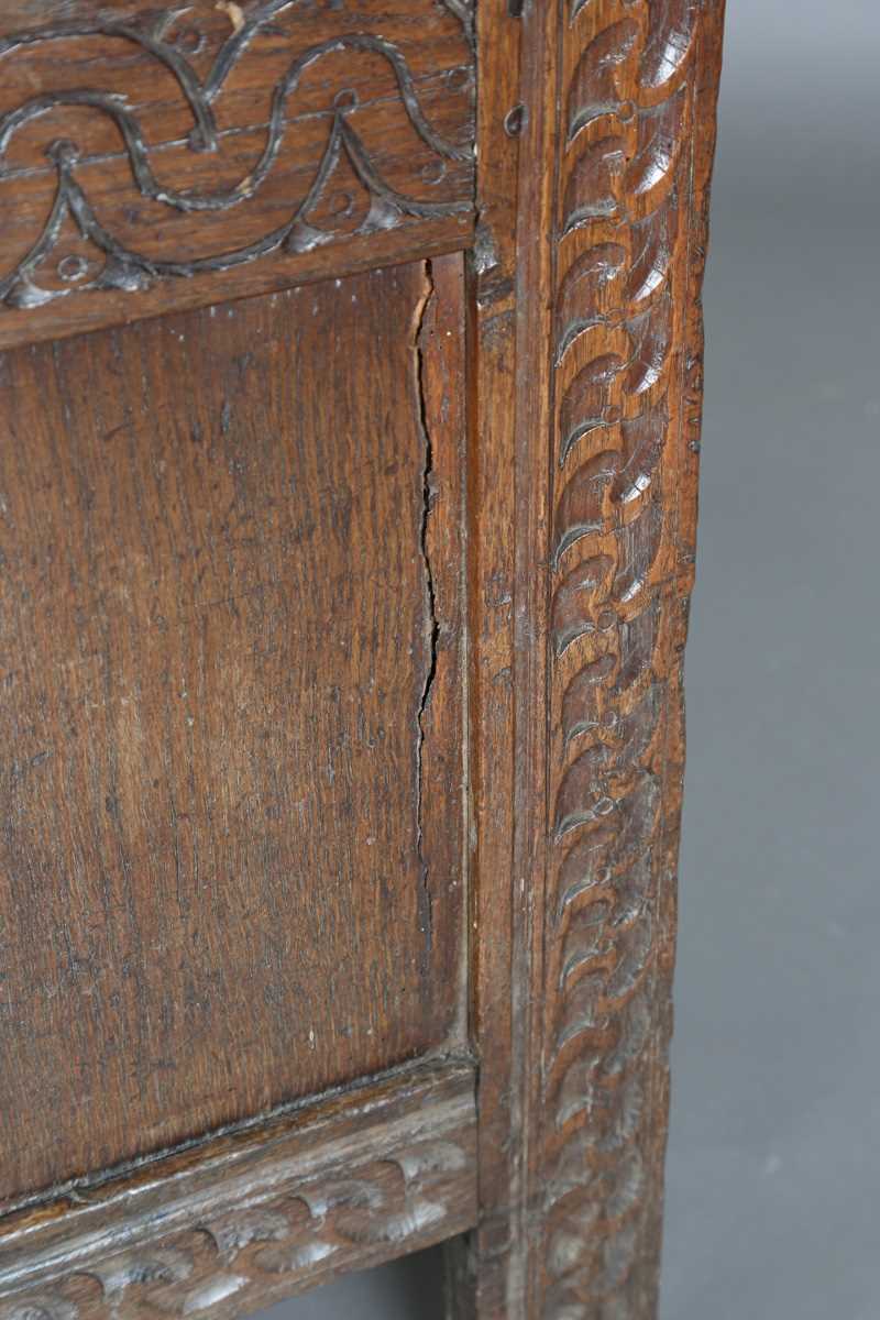 A 17th century oak panelled coffer, the lid with original wire hinges, height 71cm, width 125cm, - Image 12 of 17