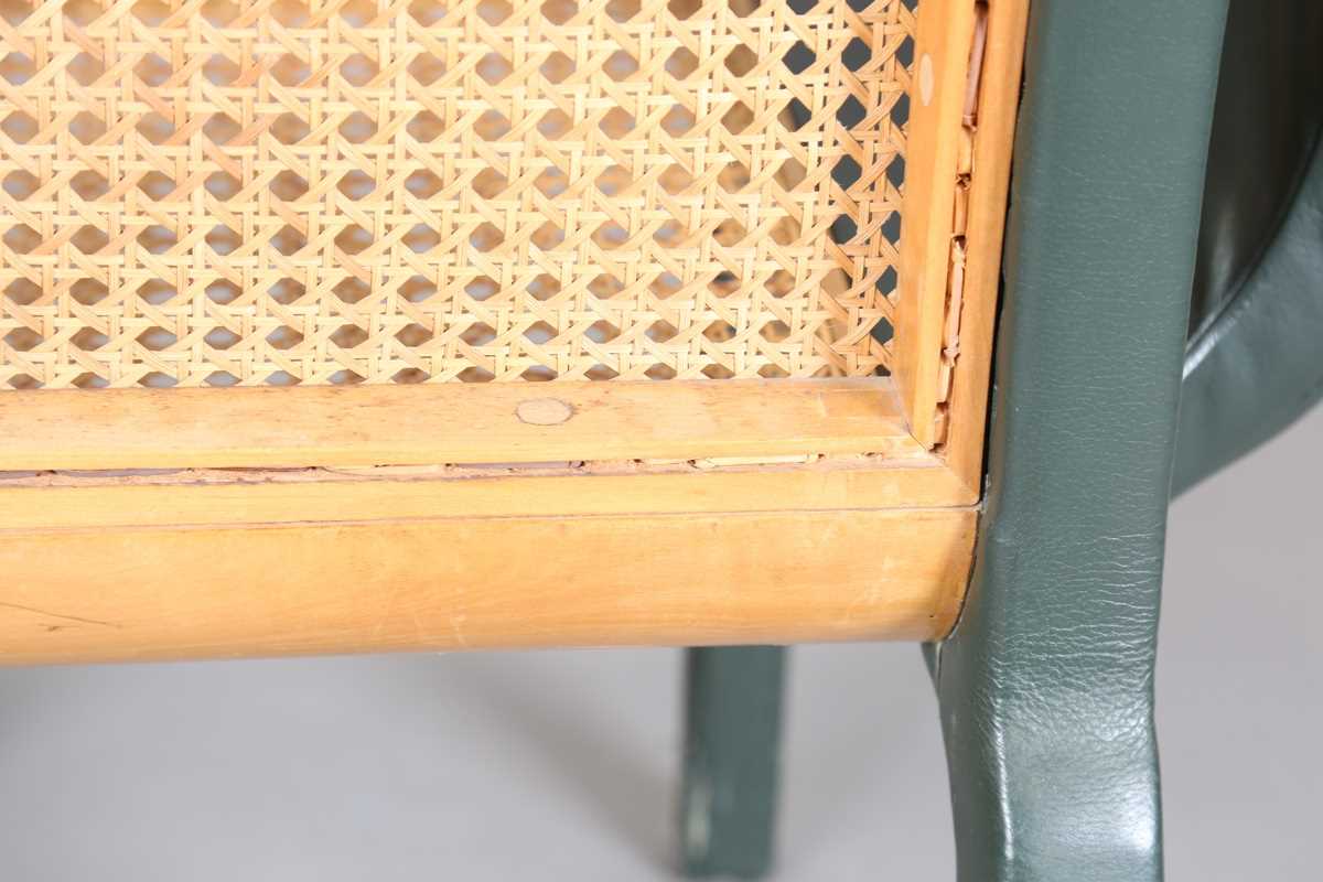 A John Makepeace satinwood and green leather covered armchair with a caned seat and back panel, - Image 12 of 13