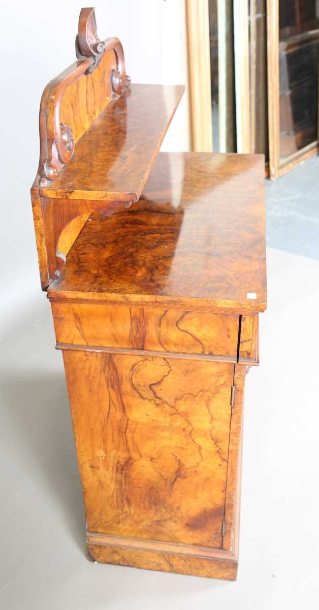 A Victorian burr walnut chiffonier, the shelf back above a drawer and a pair of mirrored doors, on a - Image 7 of 9