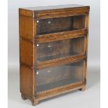 A George V oak Globe Wernicke three-section library bookcase, on block legs, height 111cm, width