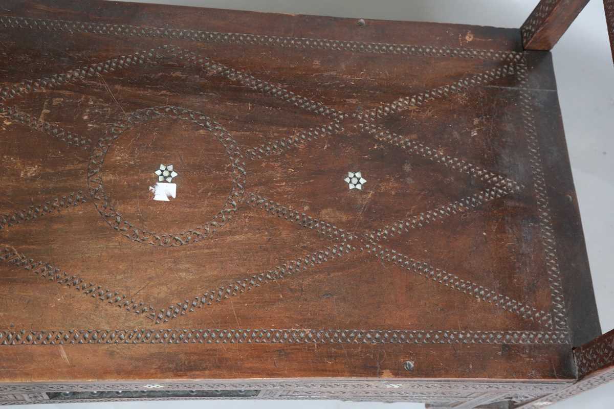 A late 19th century Middle Eastern hardwood and mother-of-pearl inlaid window seat, similar to those - Image 6 of 19