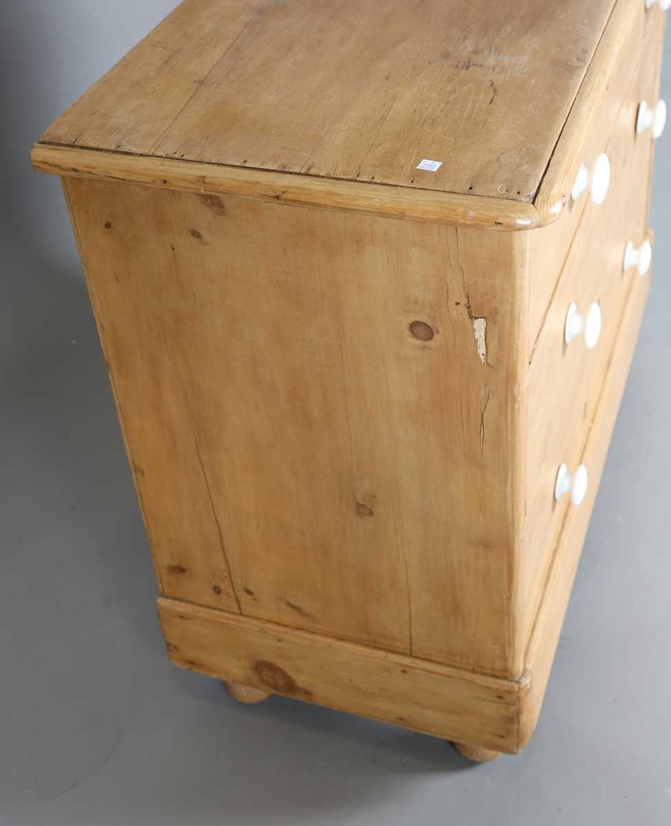 A Victorian pine chest of three long drawers, height 86cm, width 102cm, depth 50cm. - Image 6 of 9