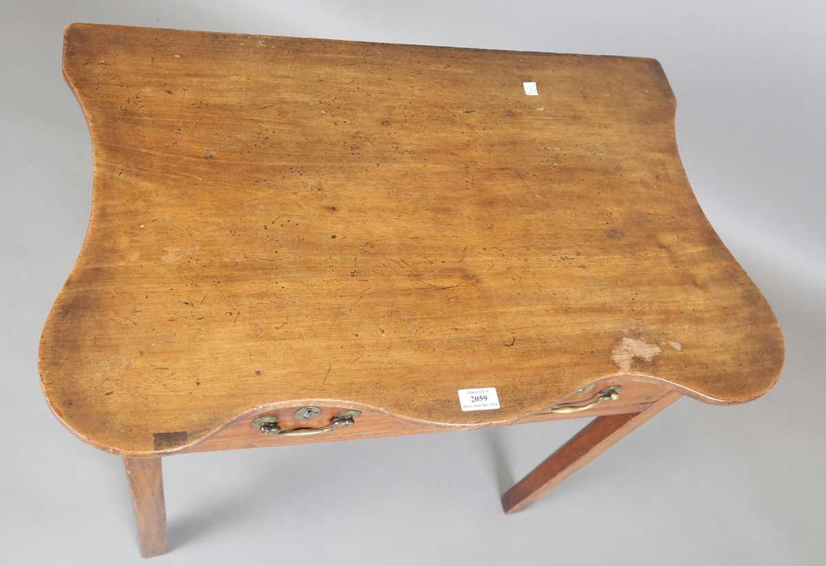 A George III mahogany side table, the later shaped top above two oak-lined drawers, height 71cm, - Image 2 of 9