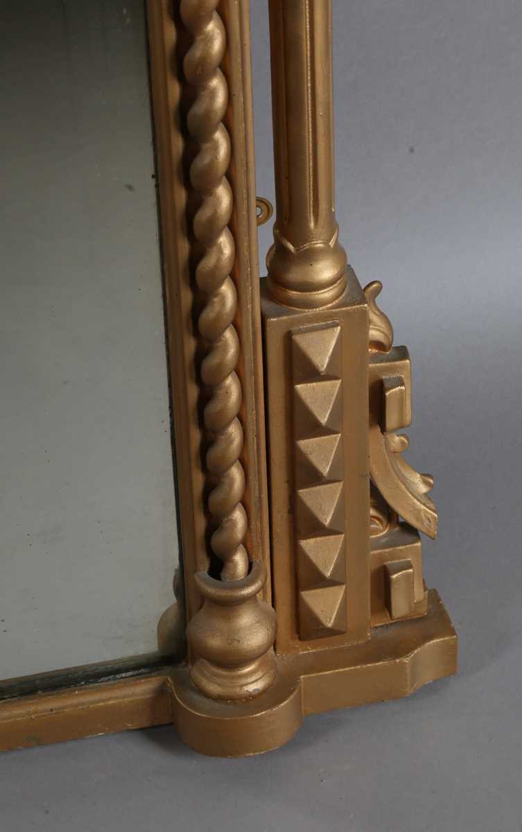 A late Victorian gilt painted overmantel mirror with pierced foliate corner panels and spiral turned - Image 6 of 9