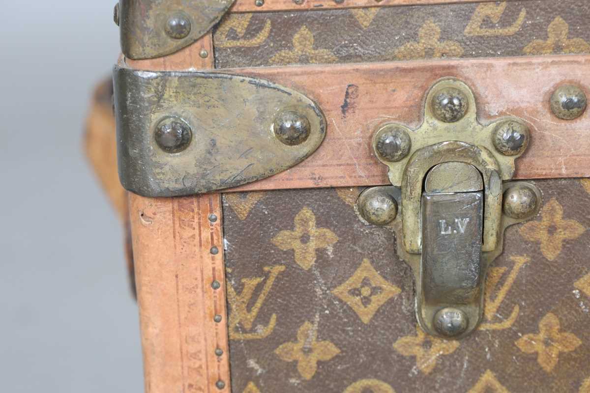 An early 20th century Louis Vuitton travelling trunk with overall monogram canvas covering and tan - Image 11 of 42