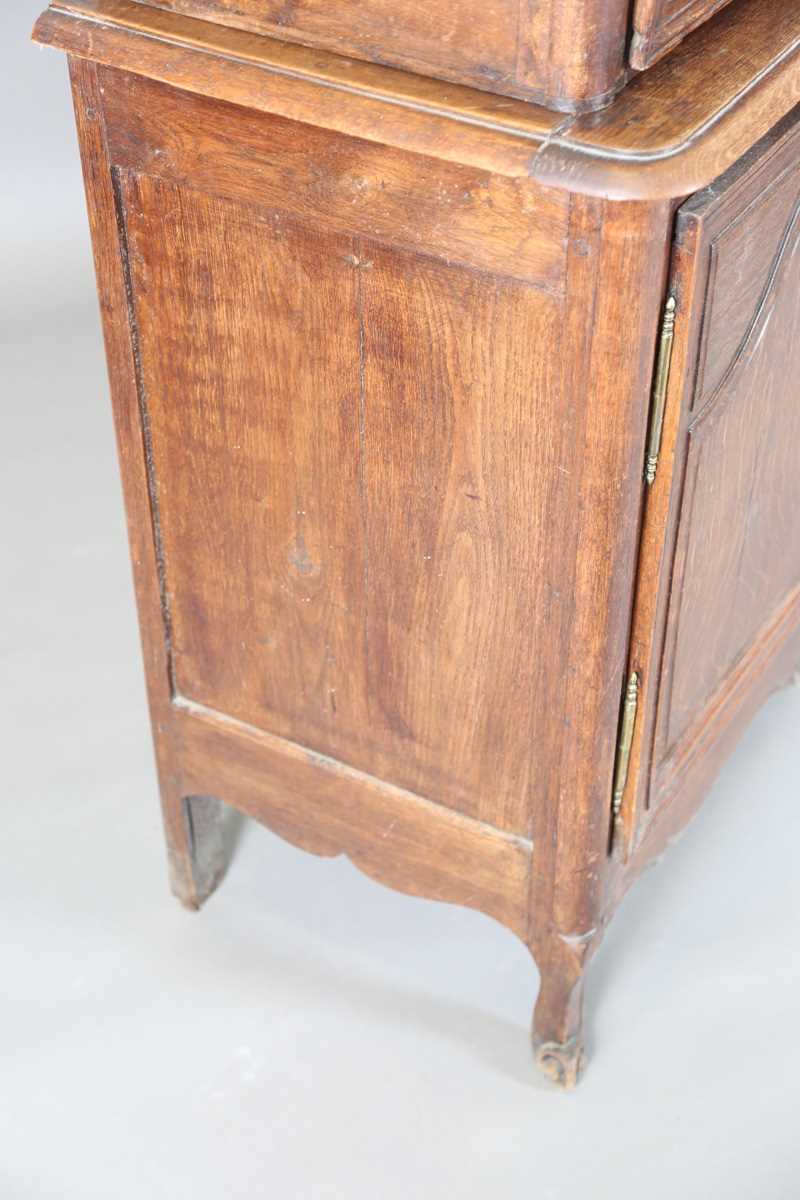 A 19th century French oak side cabinet with an arched pediment and four carved panel doors, height - Image 10 of 14