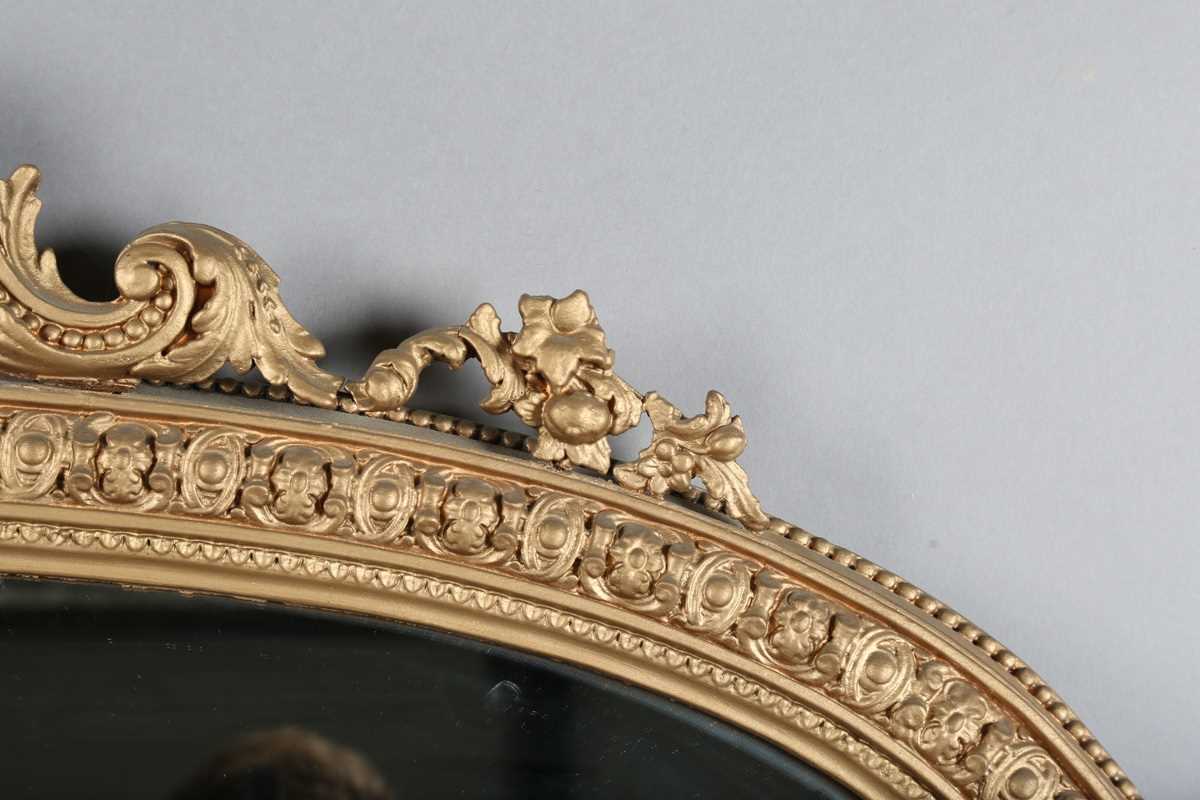 A late Victorian gilt painted overmantel mirror with foliate mouldings, height 150cm, width 112cm. - Image 3 of 11