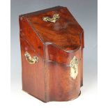 A George III mahogany knife box with a sloping lid and bowfront, fitted with brass handles and