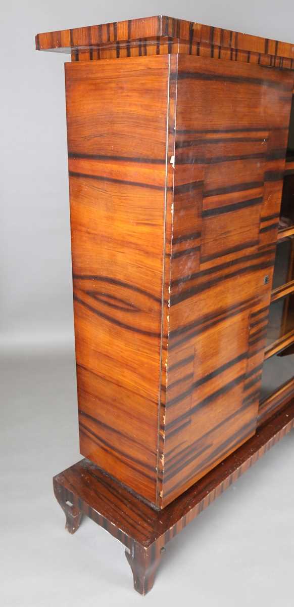 A Continental Art Deco zebrawood side cabinet, fitted with a central bevelled glass compartment - Bild 8 aus 14