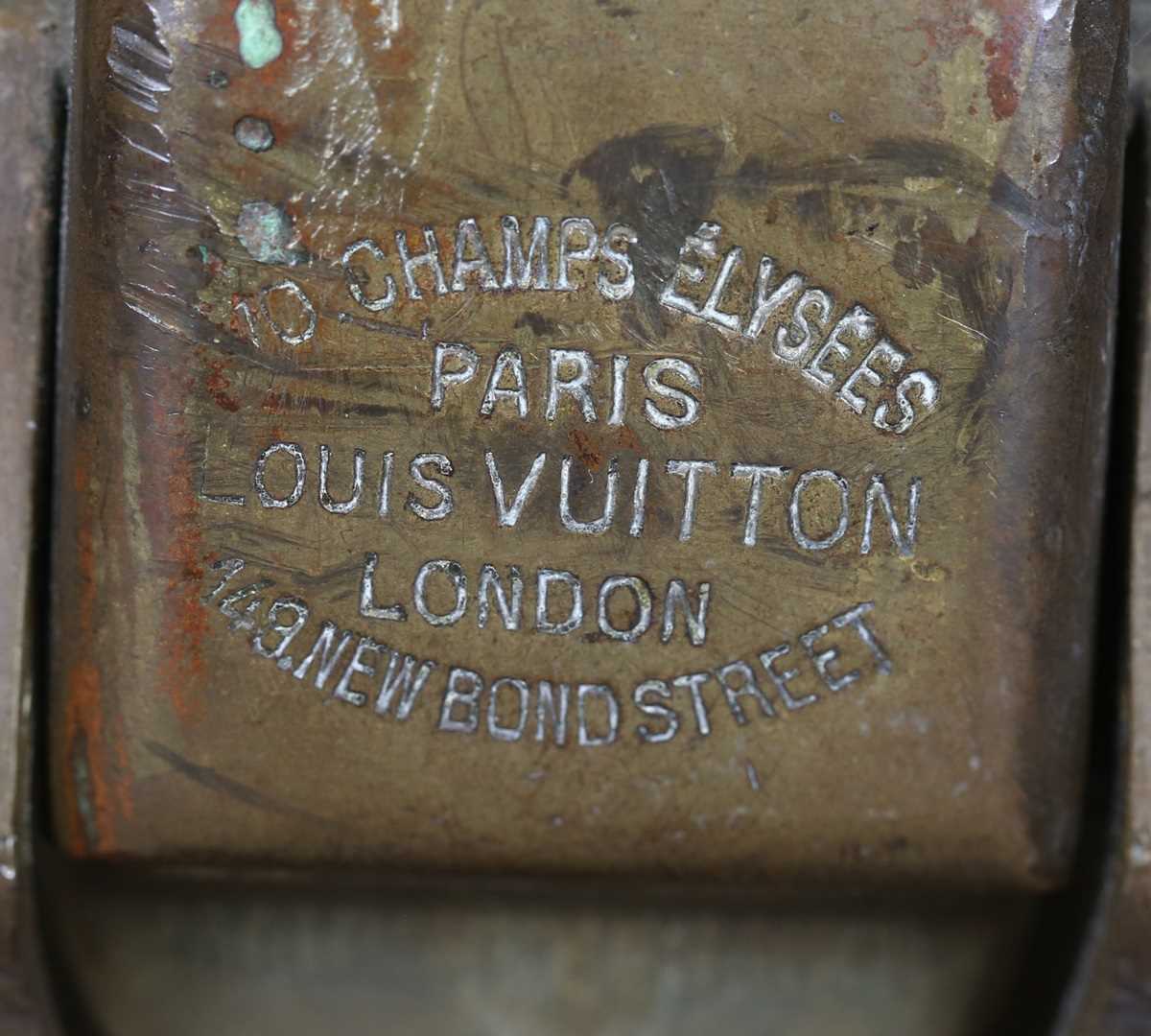 An early 20th century Louis Vuitton travelling trunk with overall monogram canvas covering and tan - Image 3 of 42