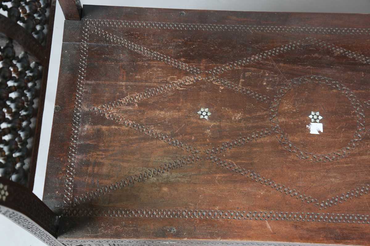 A late 19th century Middle Eastern hardwood and mother-of-pearl inlaid window seat, similar to those - Image 5 of 19