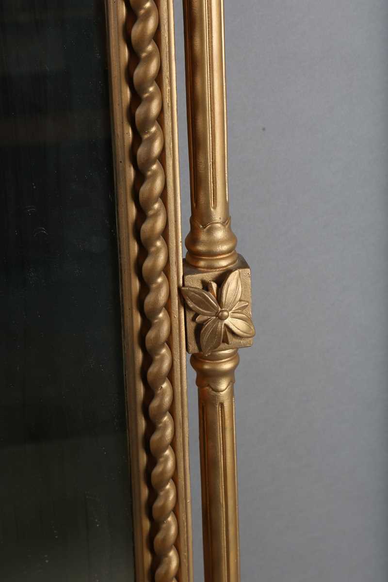 A late Victorian gilt painted overmantel mirror with pierced foliate corner panels and spiral turned - Image 8 of 9