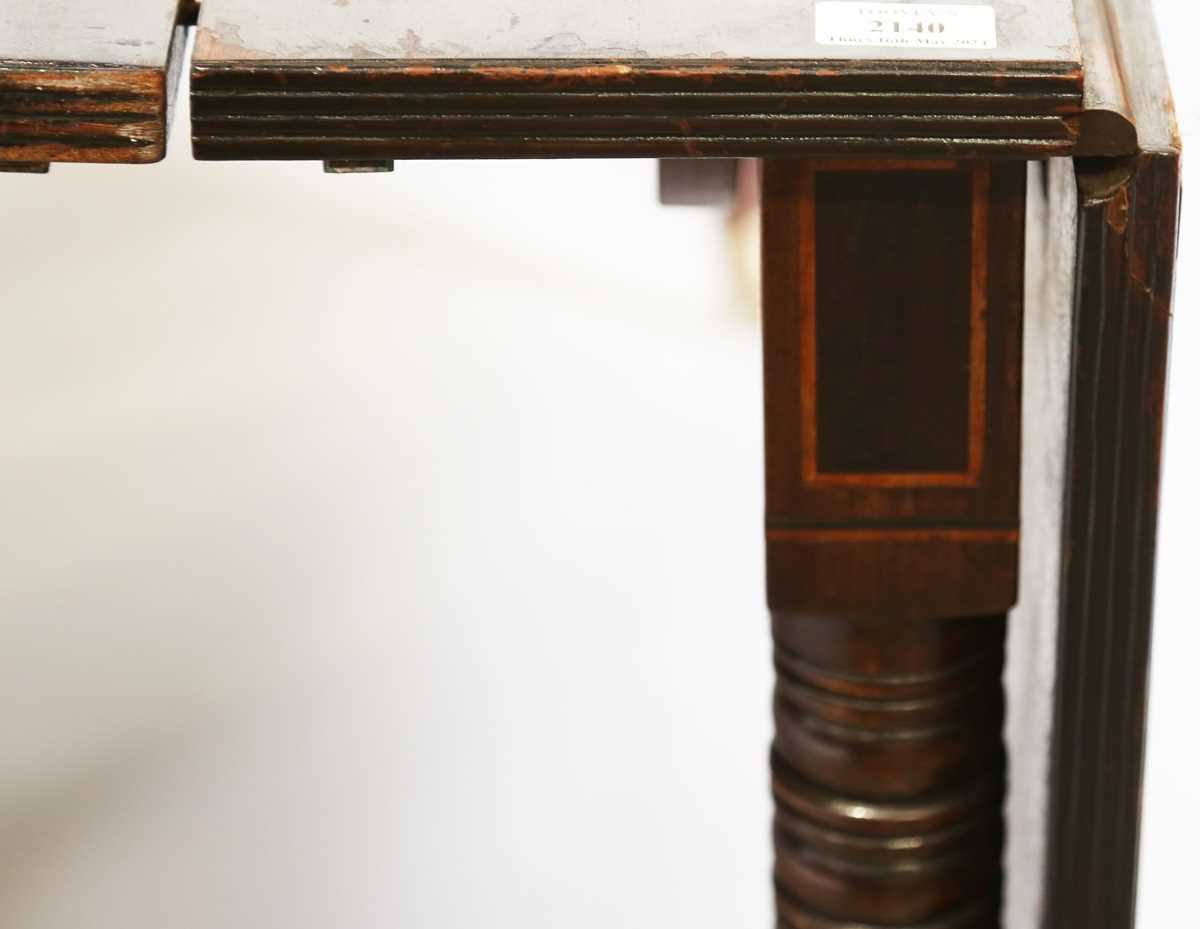 A Regency mahogany concertina-action extending dining table, in the manner of Wilkinson of - Image 13 of 16