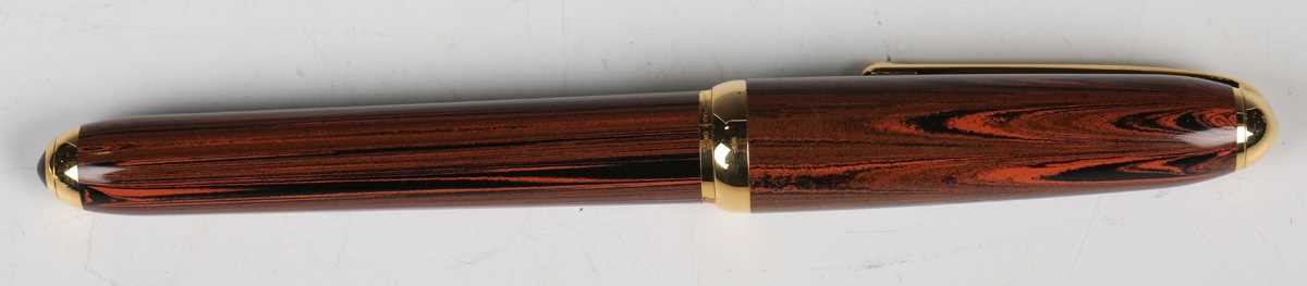 A Louis Cartier fountain pen with streaked red and black case, the nib detailed '18K', length - Image 12 of 17