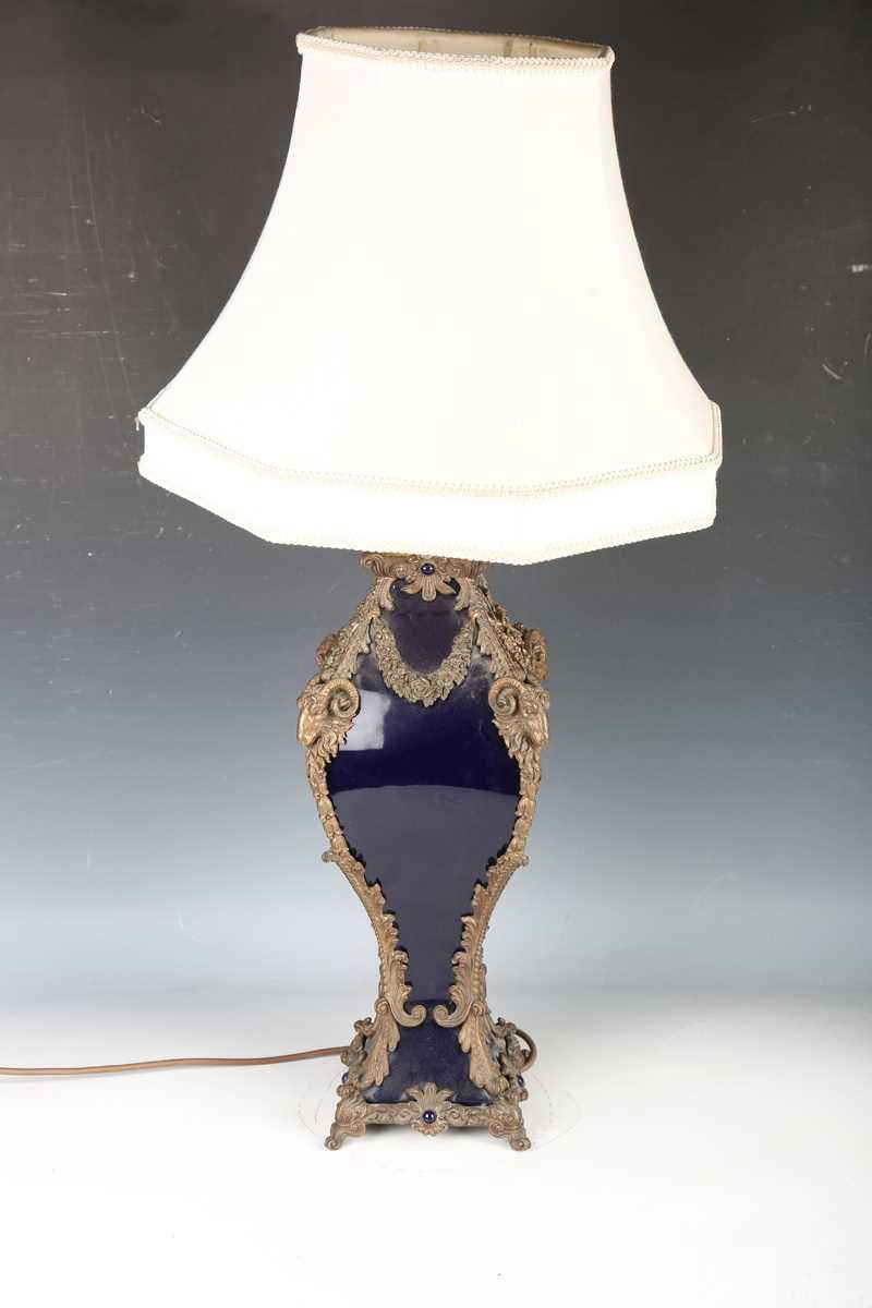 A modern blue glazed porcelain and brass mounted table lamp with ram's head and foliate mounts, - Image 9 of 11
