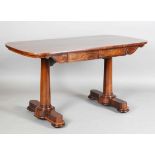 A Regency rosewood library table, the curve-ended top above two frieze drawers and turned
