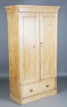 A Victorian pine wardrobe, height 197cm, width 107cm, depth 54cm.