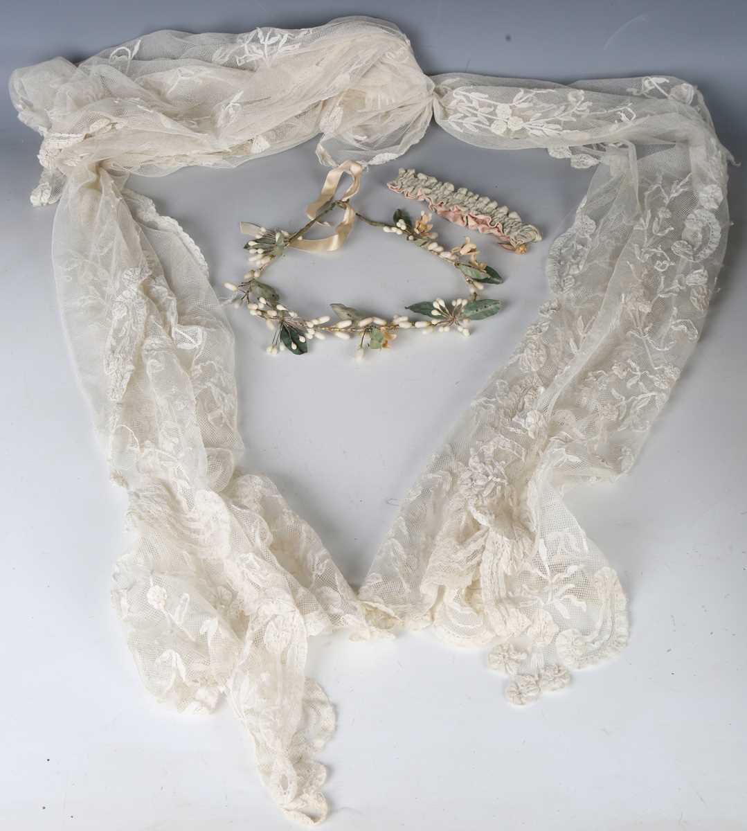 A 19th century net and applied lace stole, 300cm x 44cm, together with a wax bridal headdress and
