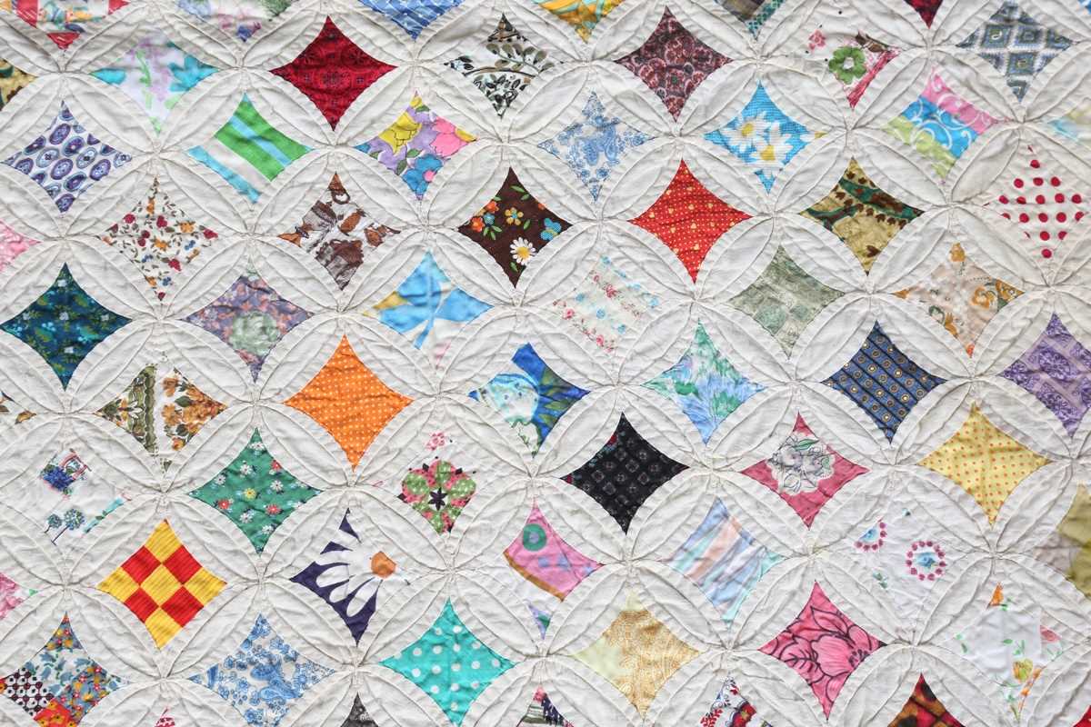 A mid-20th century 'Cathedral Window' cotton patchwork quilt, 230cm x 193cm. - Image 3 of 9