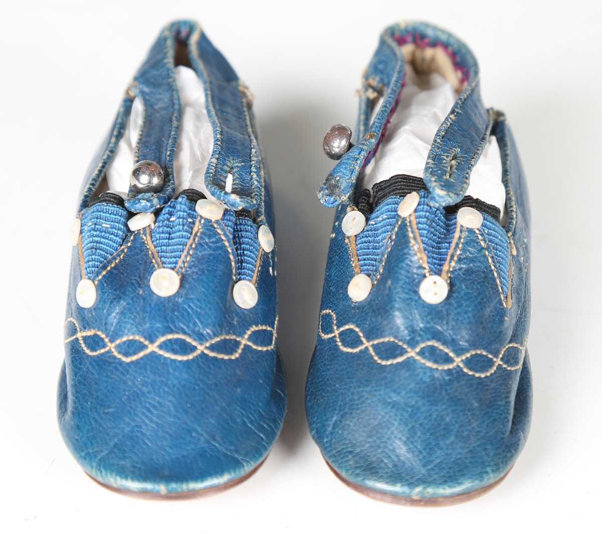 A pair of 19th century blue leather infant's shoes with applied mother-of-pearl buttons and polished - Image 7 of 8