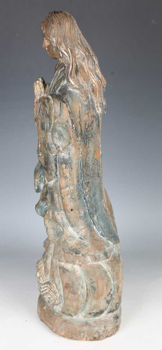 A 20th century carved wooden figure of a standing saint, height 51cm. - Image 14 of 18