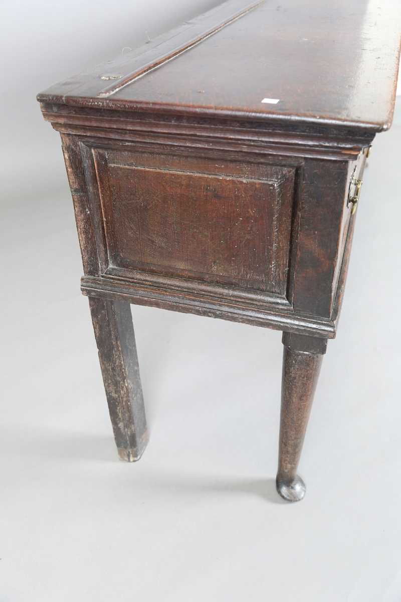 An early 18th century provincial oak dresser base, fitted with three deep drawers, height 77cm, - Image 10 of 13